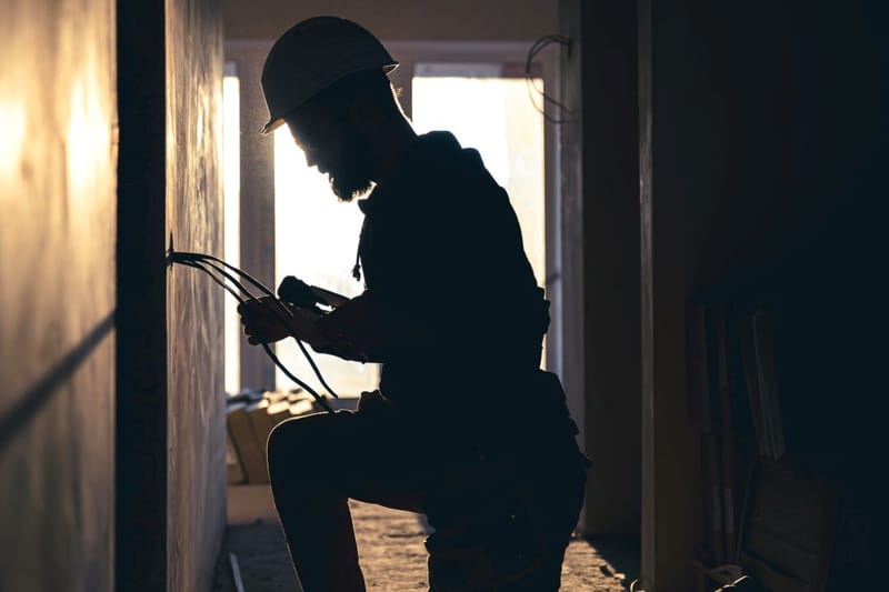 What is a licensed electrical worker (LEW) in Singapore?